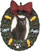 cat framed in wreath